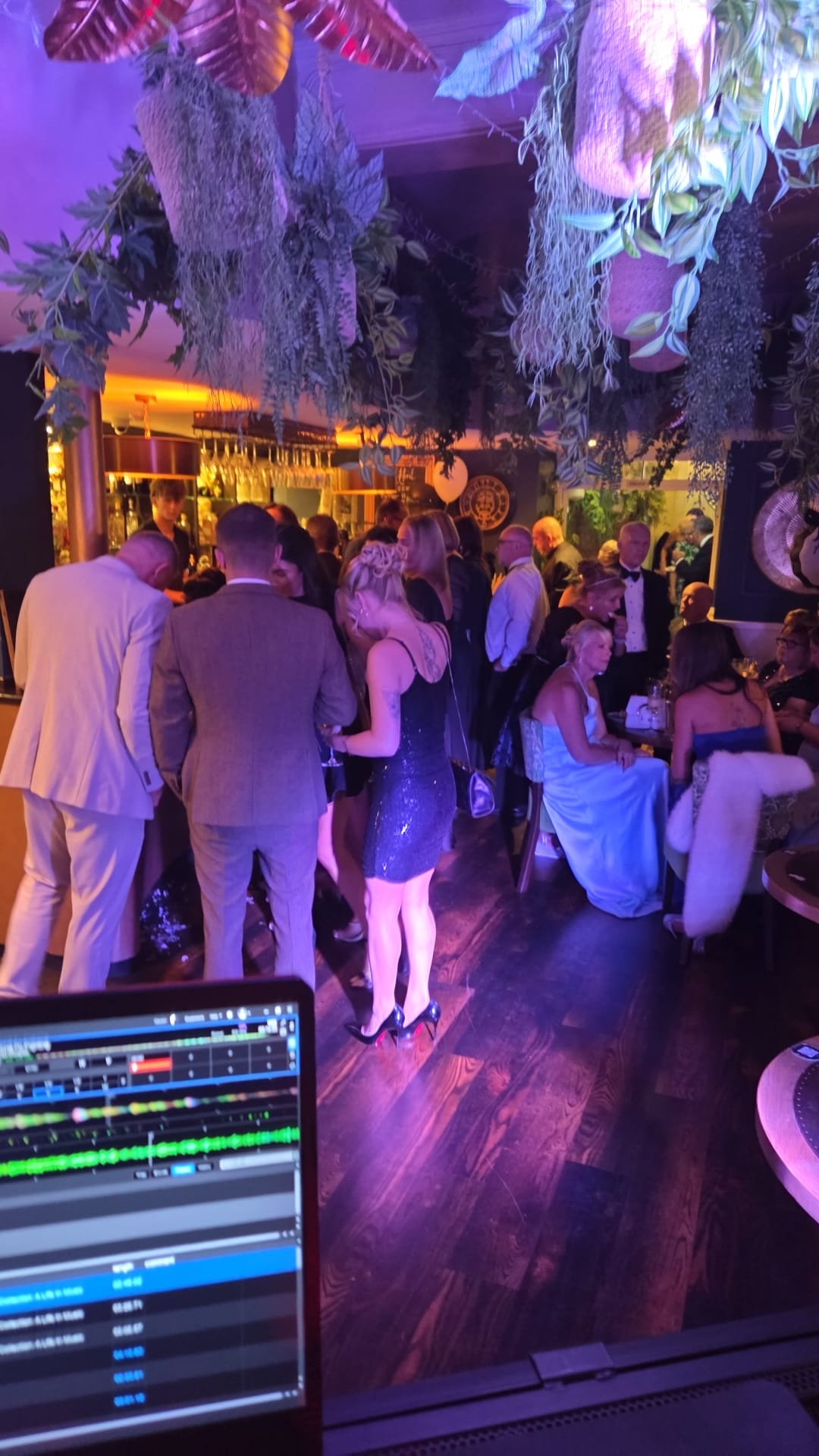 DJ view of guests at an evening party in Sussex