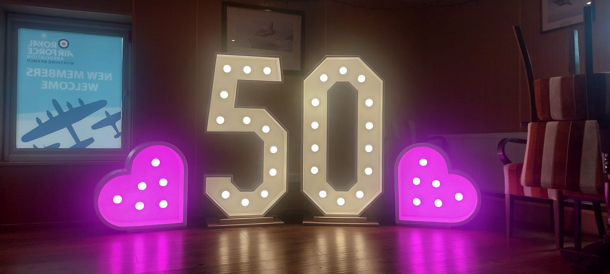 Light-up 50 numbers with pink hearts at a Worthing birthday party